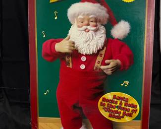 Jingle Bell Rock Santa Figurine ($25)