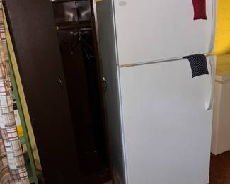 Storage wardrobe & a Frigadaire refrigerator.