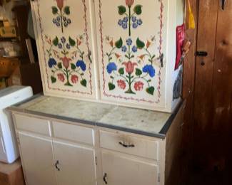 Floral kitchen cabinet.