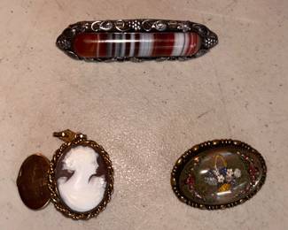 top item is a WONDERFUL Italian Resistant Revival - Fratelli Peruzi sterling silver banded agate broach,  on the left  -  a  vintage 10K GF locket,  on the right - goofus glass oval flower basket brooch,