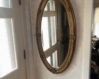 hallway gilt oval framed mirroe