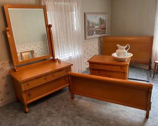 A GREAT Birds-Eye-Maple bedroom set including the ladies dresser, the 3 drawer chest and the bed  with frame. NOTE: the white ironstone pitcher and wash basin.