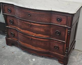th Century Flame Mahogany Serpentine Front MarbleTop Chest of Drawers