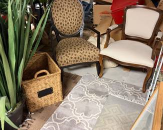 Life like house, plants, woven baskets, accent chair, chairs