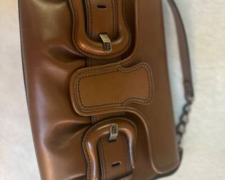 Vintage Fendi brown leather shoulder bag featuring dual oversized buckle details with signature FF logo hardware.