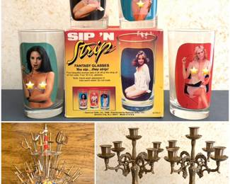 a vintage set of Sip 'N Strip Fantasy Glasses, a vintage set of miniature Toledo sword cocktail picks with a tiered brass stand from mid-century Spain. And two brass candelabra’s. 