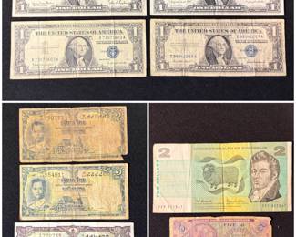 A collection of vintage U.S. and foreign paper currency.