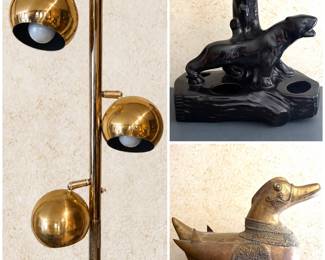 a vintage mid-century modern brass floor or tension pole lamp with three adjustable spherical globe lights. Plus a  a vintage mid-century modern black panther ceramic table lamp and planter and a vintage brass duck figurine. 