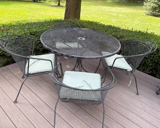 Woodard patio table with 4 club chairs