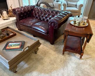 Chesterfield 2-cushion leather loveseat, Bernhardt coffee table and vintage bar cart with vintage glassware