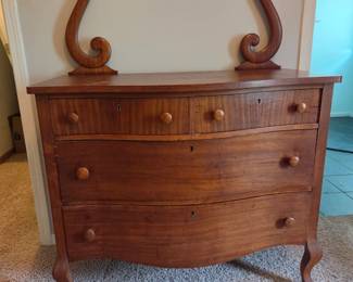 Turn of the century dresser has mirror also
