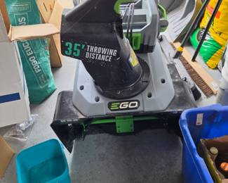 Battery powered snow blower