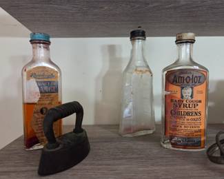 Antique bottles, iron