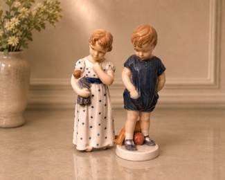 Royal Copenhagen boy and girl figurines
