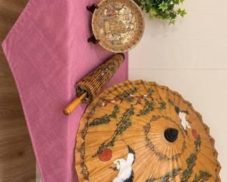 Chinese umbrellas, plate and statue