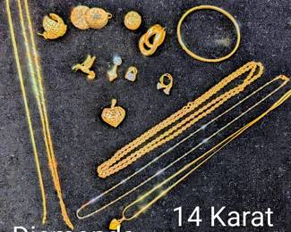 Diamond pendants, earrings, beautiful bangle and necklaces all in 14 karat gold