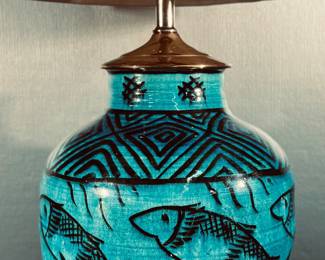 Turquoise pottery lamp with fish motif