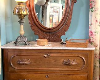 Vanity with mirror and beautiful globe lamp