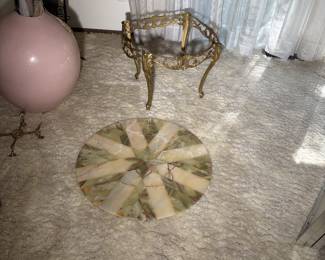 marble table and brass
