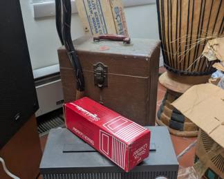 vintage slide projectors and screens