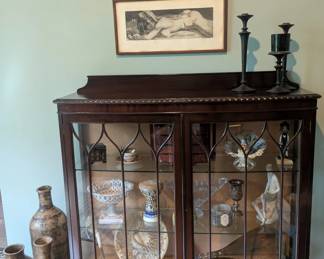 Antique cabinet with Persian instruments and native decor