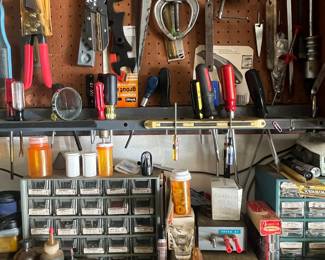 Assorted Vintage Hand Tools and Workbench Storage with Craftsman Clamps and Thunderbolt Power Supply