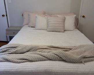 Queen sized mattress with frame