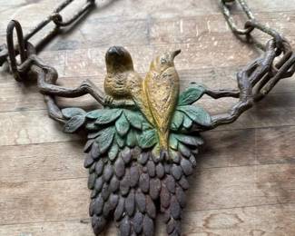 009 castironhangingchainwithpaintedbir