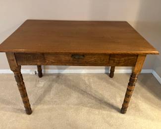 Antique tiger oak library table