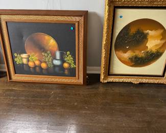 Oil paintings with ornate frames