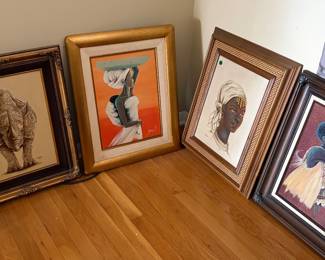 Various oil paintings with ornate frames