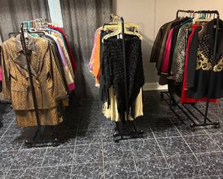 Designer suits featuring St John.  Business casual women's suits, skirts, trousers, blouses, etc. sizes 8-12