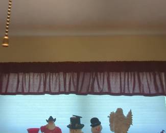 Burgundy Rod Pocket Valance and Assorted Christmas Figurines