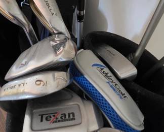 Various golf clubs
