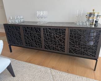 Console by BDI with laser cut geometric detail