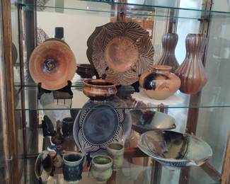 China Cabinet full of pottery