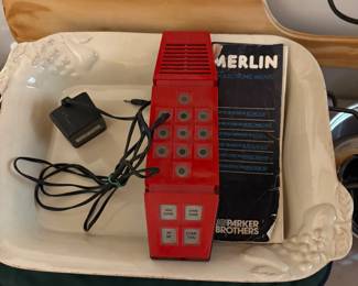 Vintage Merlin game with adaptor and instructions