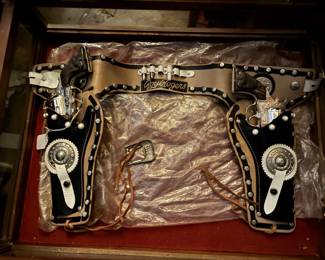 Roy Rogers cap guns and belt w/holsters.  Pristine condition