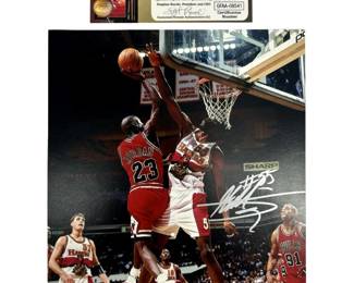 Dikembe Mutombo Signed Michael Jordan Photo