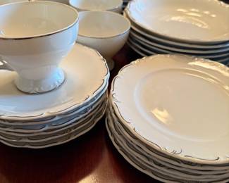 6 piece set of China including Plates, salad bowl, coffee cup and saucer and bread plate or dessert