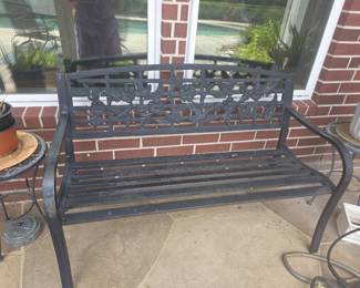 Cast Iron Outdoor Garden Bench with flora and bird Motif.