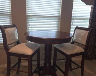 Wood Pub Table set with 2 Upholstered Bar Stools.