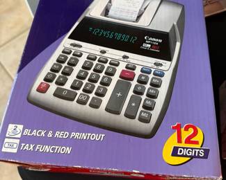 Cannon 2 color print large calculator.