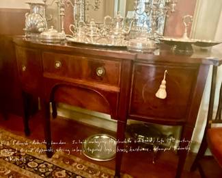 Inlaid Mahogany Hepplewhite sideboard, late 19th century. Bowed D-end cupboards, string inlay, tapered legs, brass hardware. Stamped Edwards & Roberts.