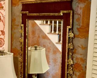 Federal style mahogany looking glass with gilt eagle crest and hanging gilt swags.