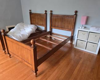 Pair of twin beds and a king size bed topper