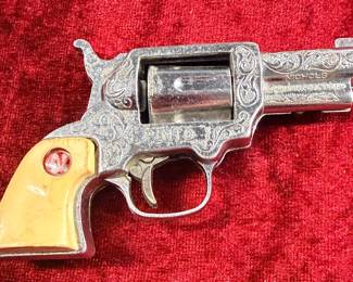 Cap pistol by Nichols. It is called a pinto.