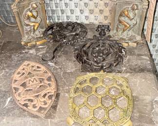 Cast-iron and brass, including nice pair of book ends and a Griswold trivet