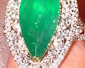Large emerald diamond and platinum ring