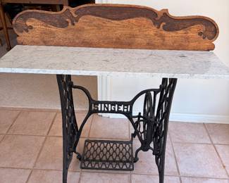 Singer treadle sewing machine table with marble top